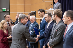 rector presenting the award